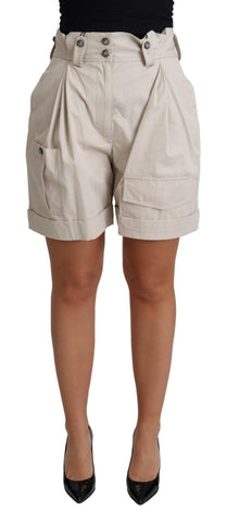 Beige cotton pleated high-waist casual shorts by Dolce & Gabbana, showing front view with pleats and wide waistband.