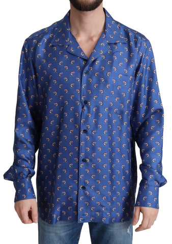 Blue silk shirt with beach umbrella print from Dolce & Gabbana, featuring a relaxed fit and vibrant, tropical-inspired design.