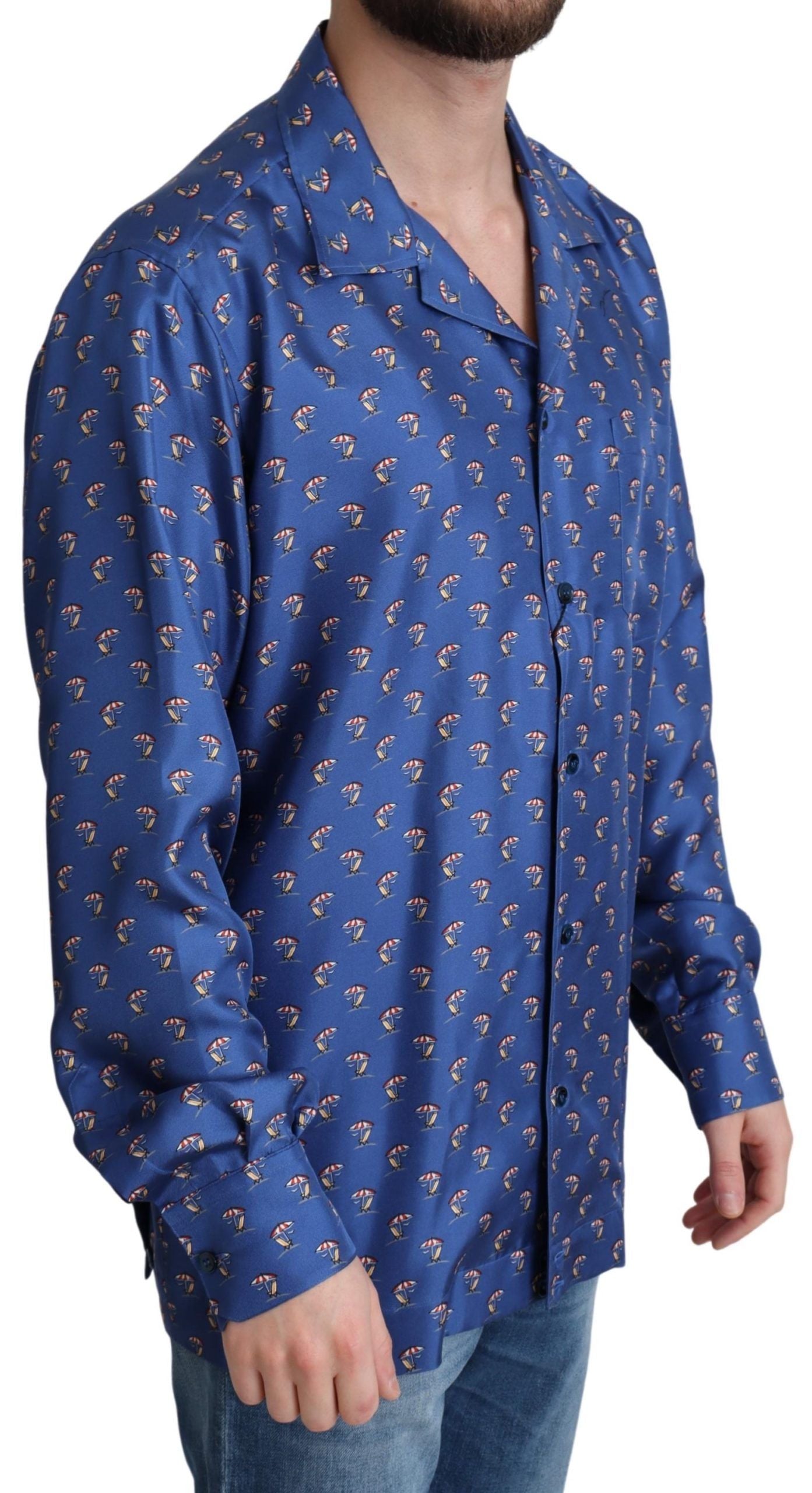Blue silk shirt with beach umbrella print by Dolce & Gabbana, featuring a relaxed fit and vibrant summer-inspired design.