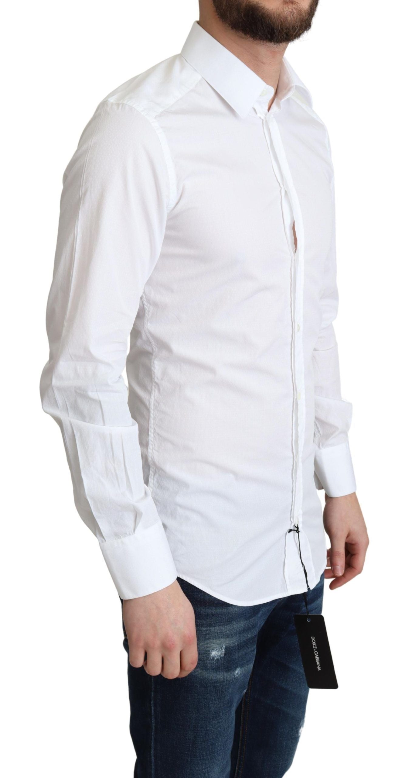 White cotton long-sleeve men's formal shirt from Dolce & Gabbana or Ermanno Scervino, displayed flat with collar and button details.