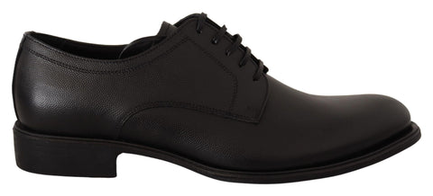 Black leather lace-up men's formal derby shoes by Dolce & Gabbana, featuring polished finish and classic design.