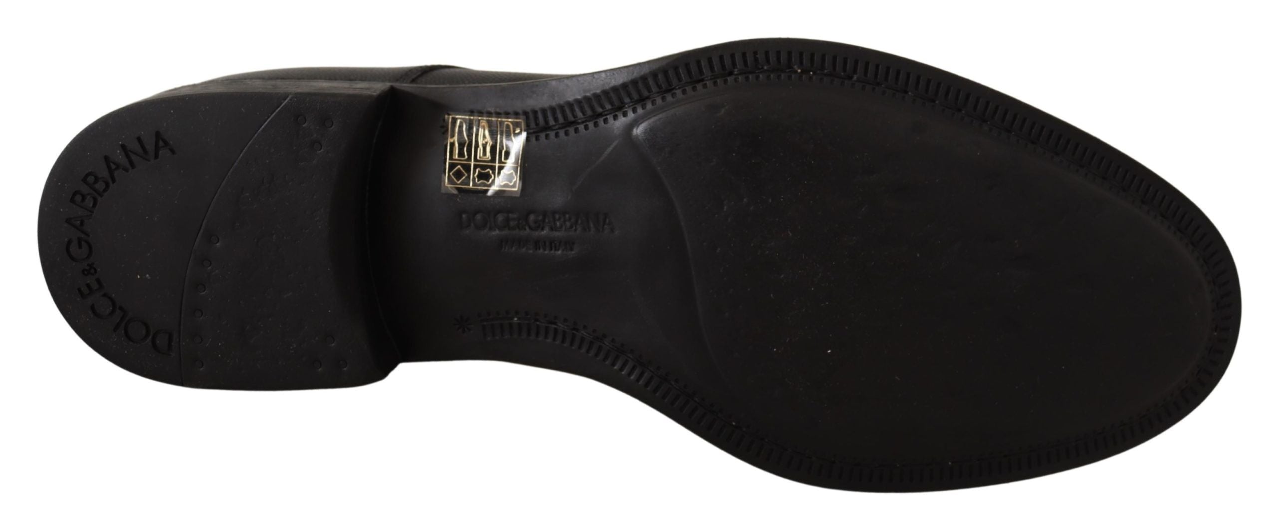 Black leather lace-up men's formal derby shoes by Dolce & Gabbana, featuring classic design and polished finish.