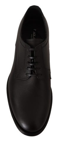 Black leather lace-up men's formal Derby shoes by Dolce & Gabbana, featuring classic design and polished finish.