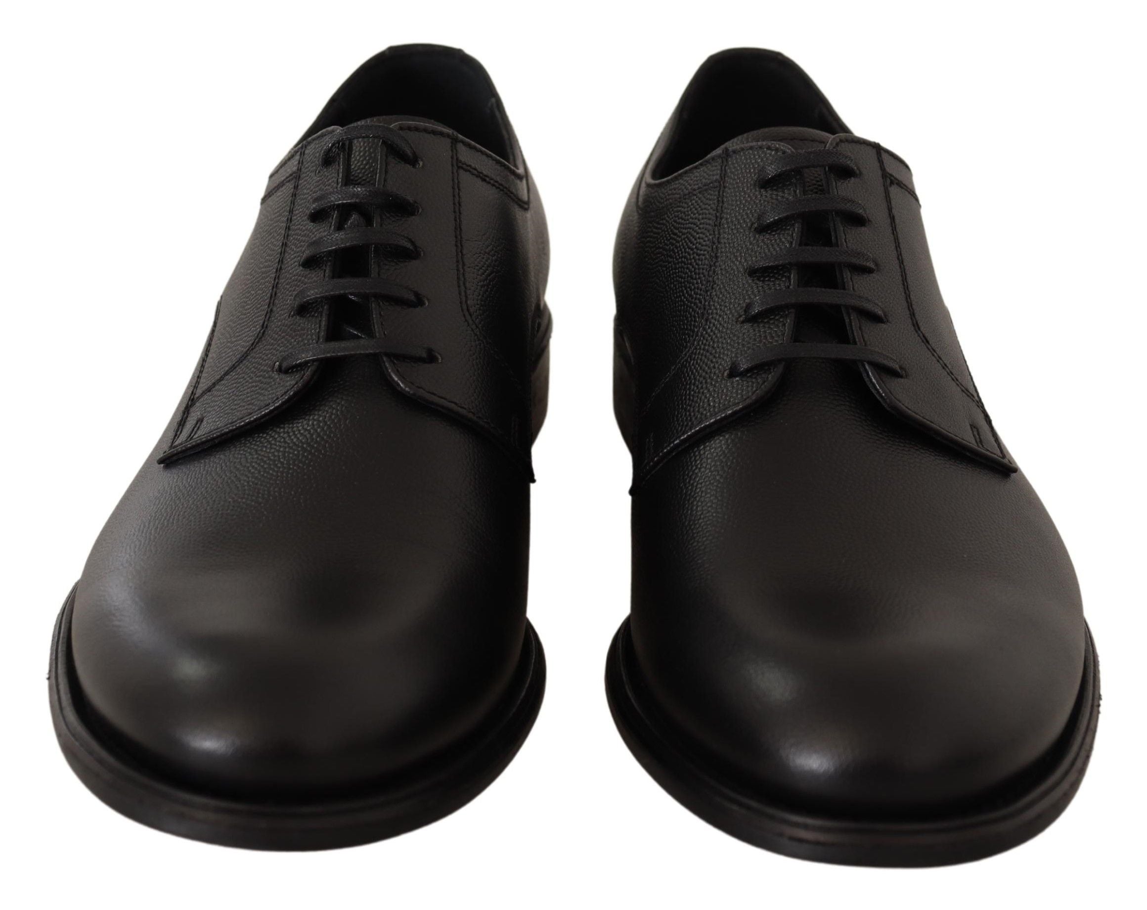 Black leather lace-up men's formal derby shoes by Dolce & Gabbana, featuring polished finish and classic design.