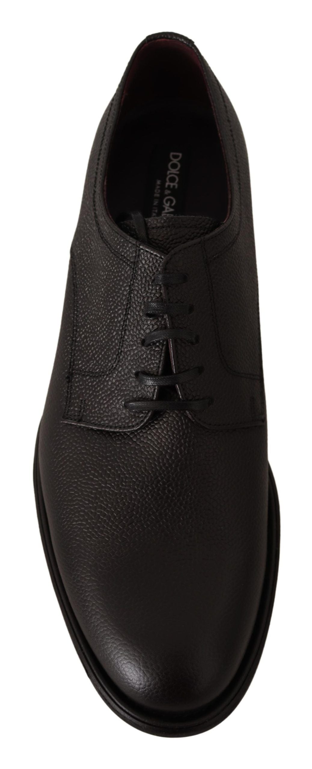 Black leather lace-up men's formal derby shoes by Dolce & Gabbana, featuring sleek design and polished finish.