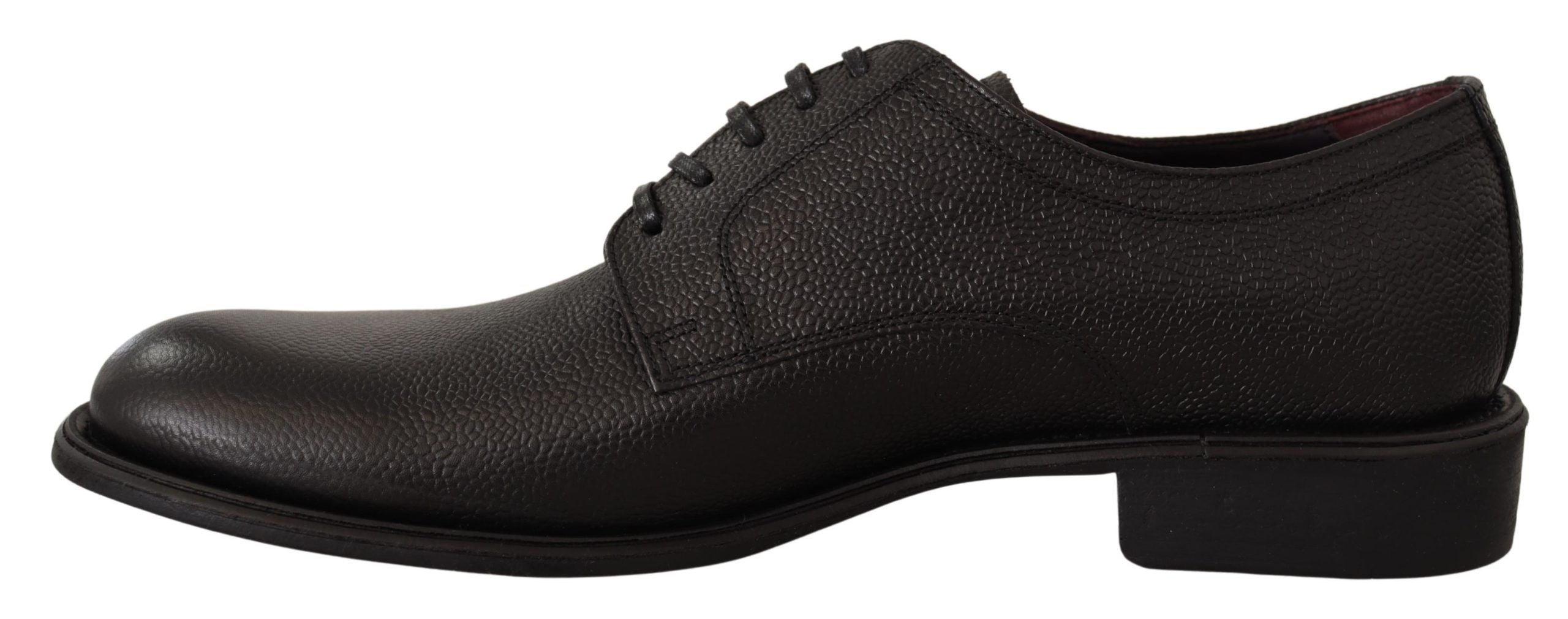 Black leather lace-up men's formal derby shoes by Dolce & Gabbana, featuring classic design and polished finish.
