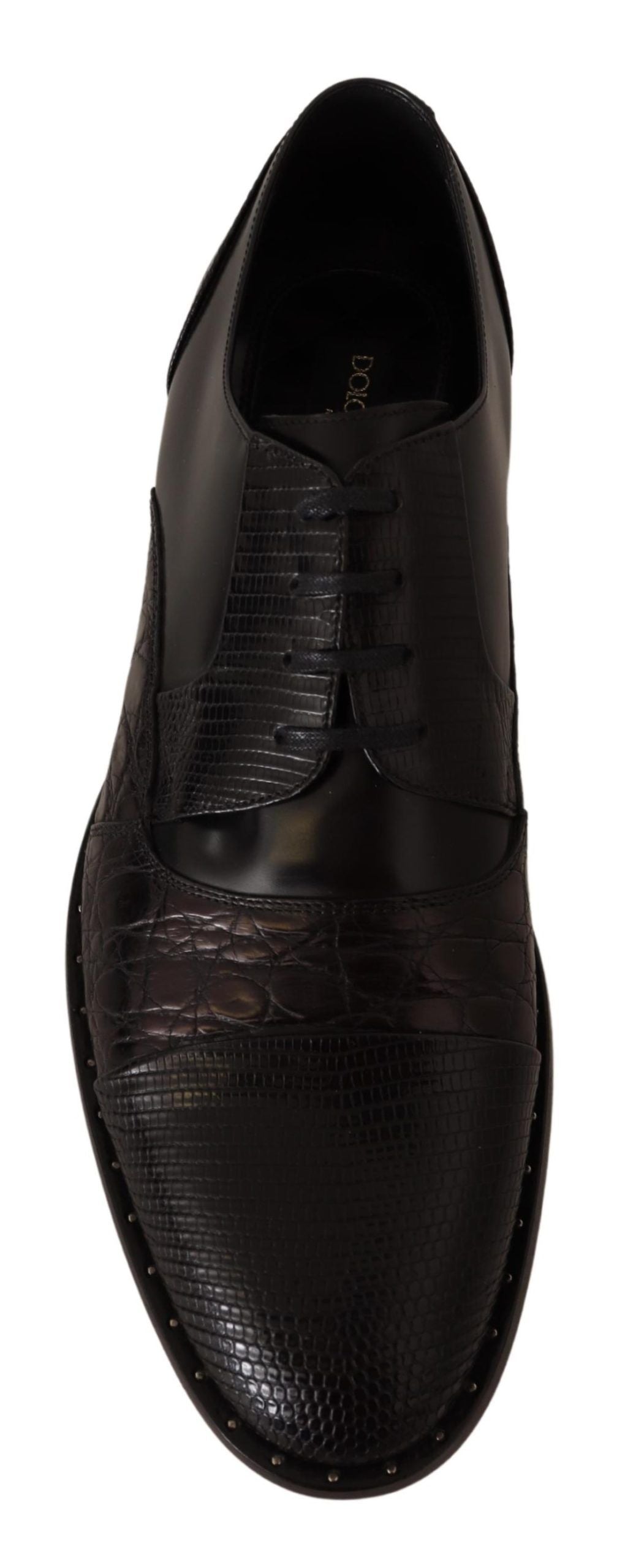 Black leather exotic skins formal shoes by Dolce & Gabbana, showcasing detailed texture and sleek design.