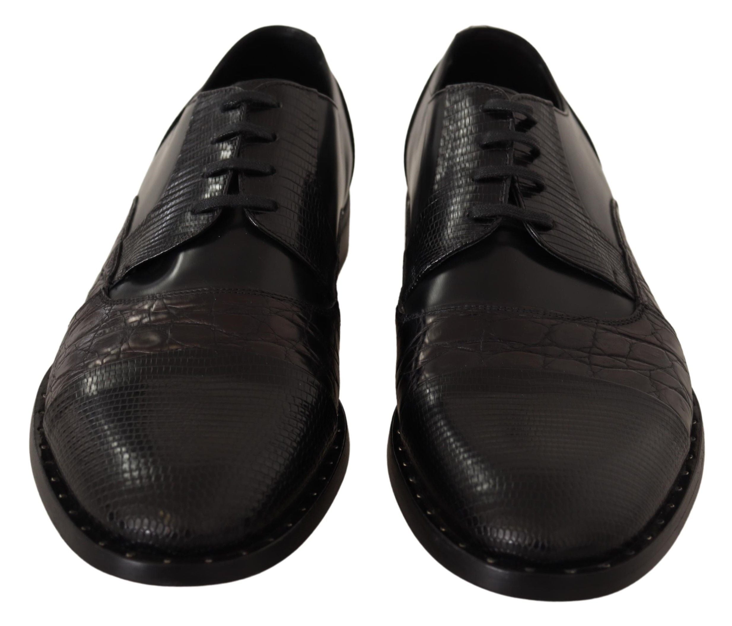 Black leather formal shoes with exotic skin details by Dolce & Gabbana, showcasing sleek design and luxurious texture.