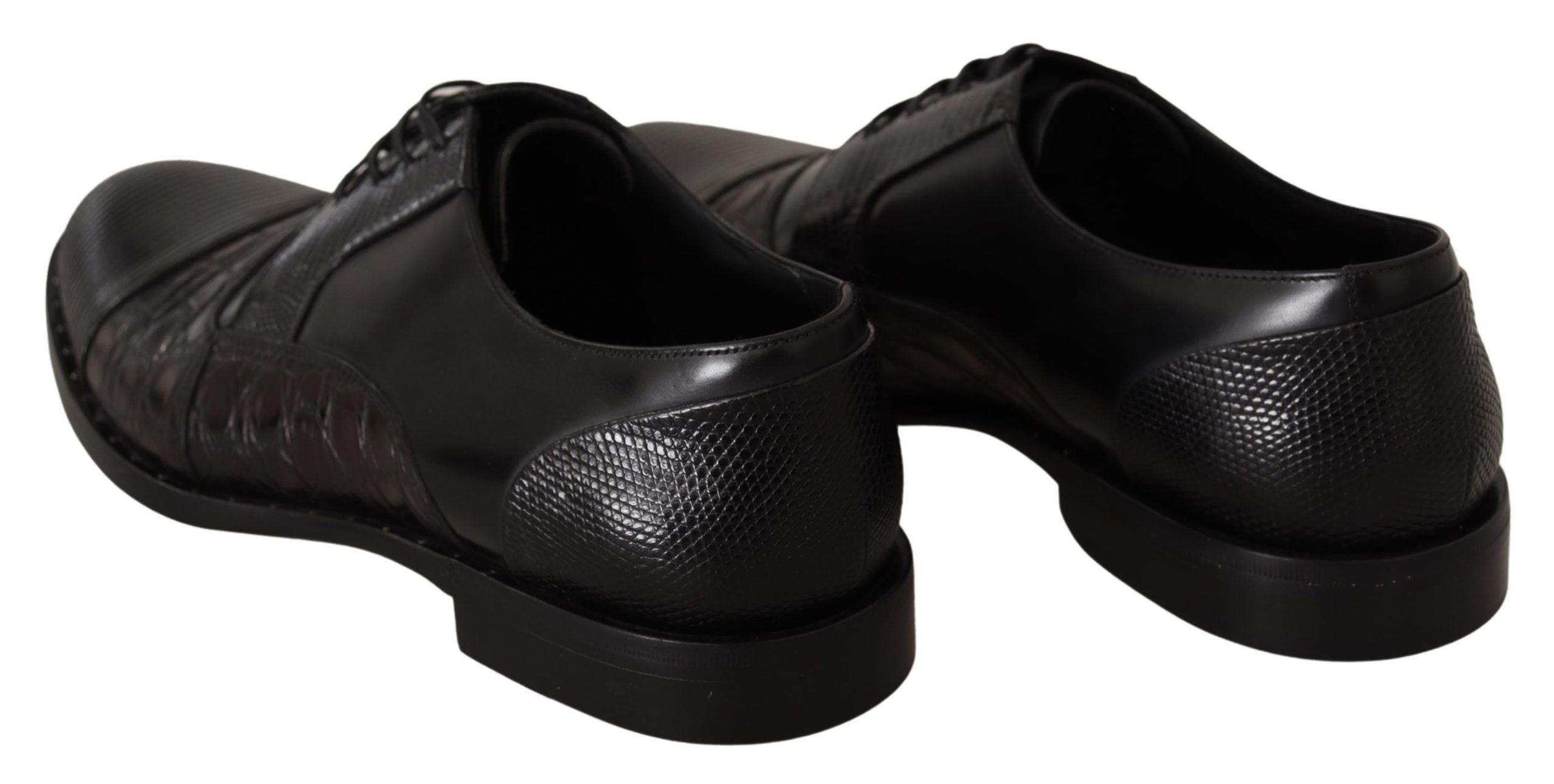 Black leather formal shoes with exotic skins detail by Dolce & Gabbana, showcasing sleek design and luxurious texture.