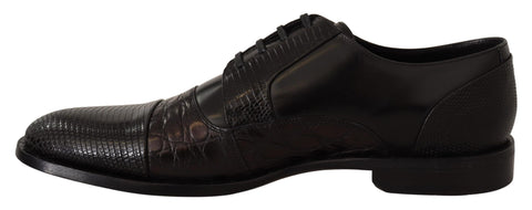 Black leather exotic skins formal shoes by Dolce & Gabbana with sleek design and detailed texture.