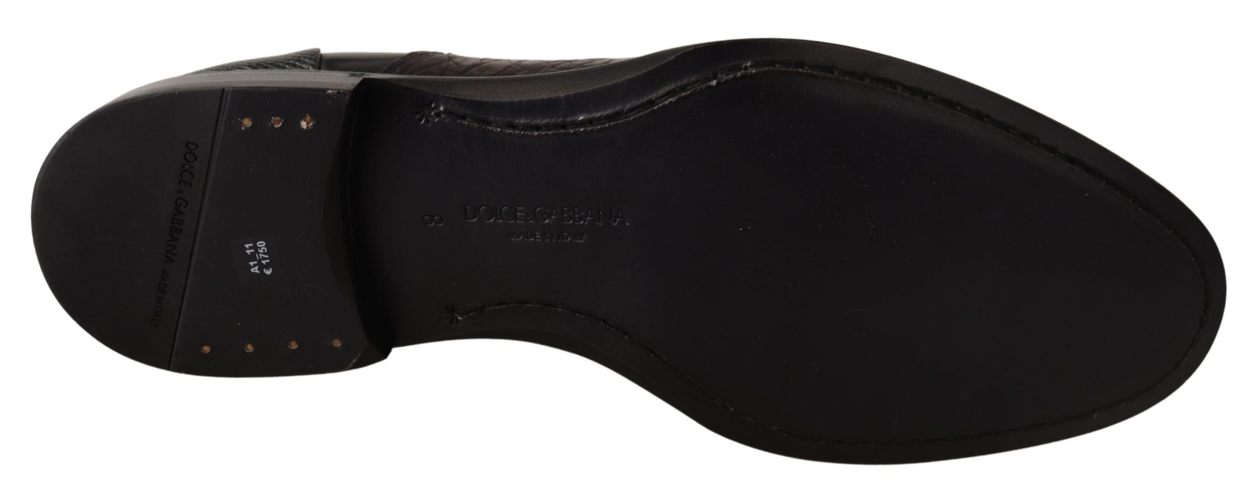 Black leather exotic skins formal shoes by Dolce & Gabbana with sleek design and polished finish.