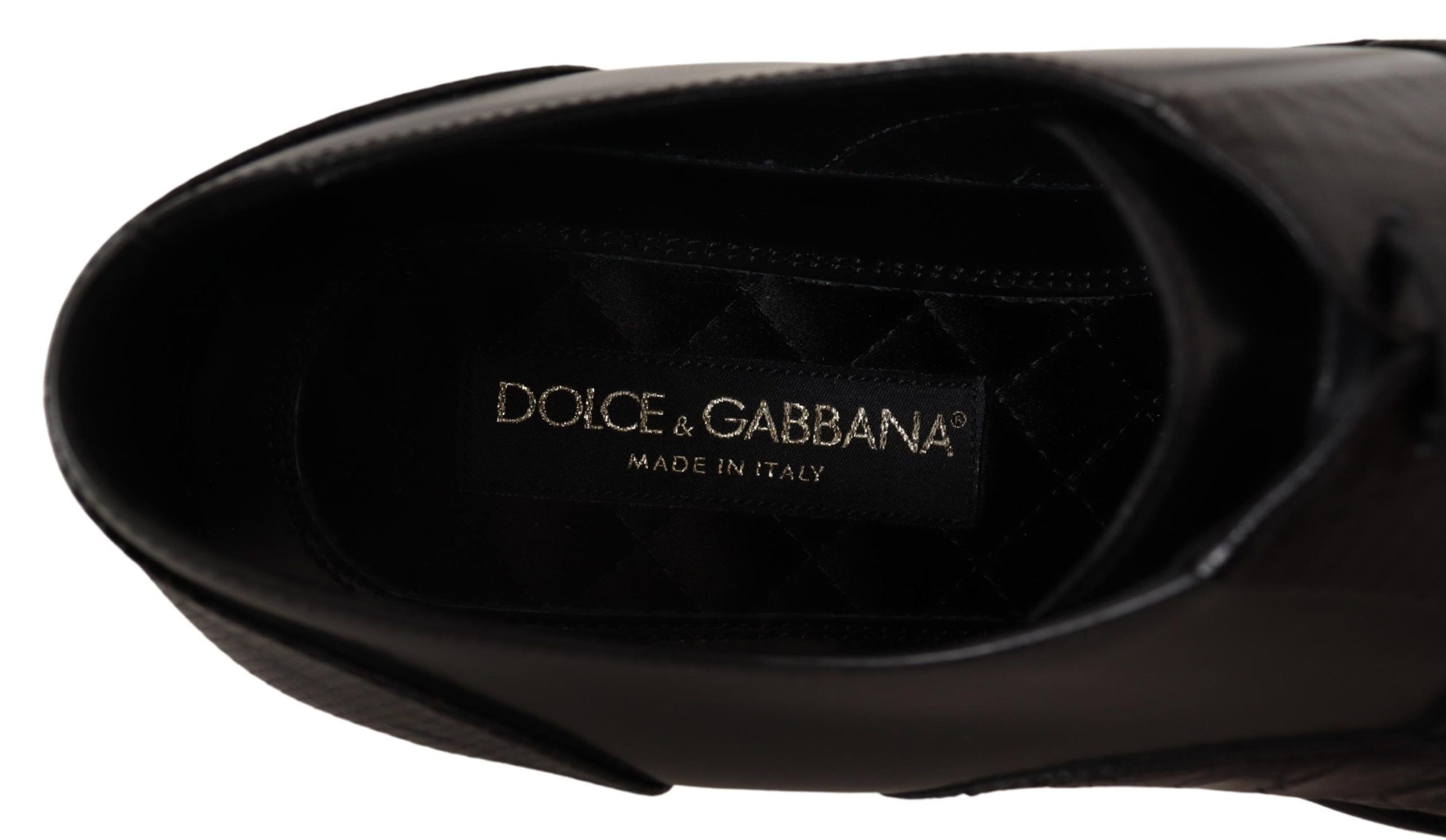 Black leather exotic skins formal shoes by Dolce & Gabbana featuring sleek design and detailed leather texture.