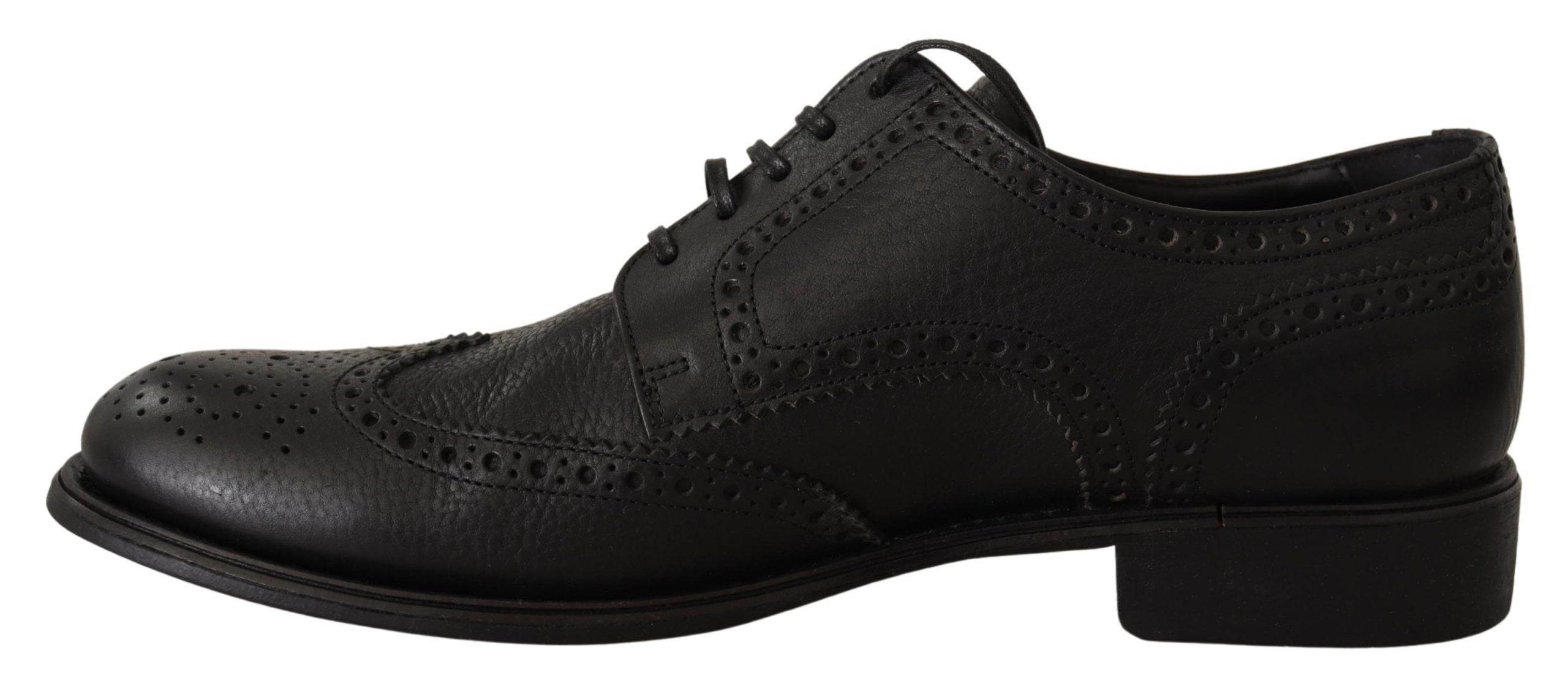 Black leather Oxford wingtip dress shoes by Dolce & Gabbana, featuring classic formal design with brogue detailing.