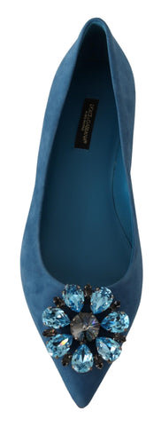 Blue suede loafers with crystal embellishments from Dolce & Gabbana, featuring a classic slip-on design and elegant detailing.