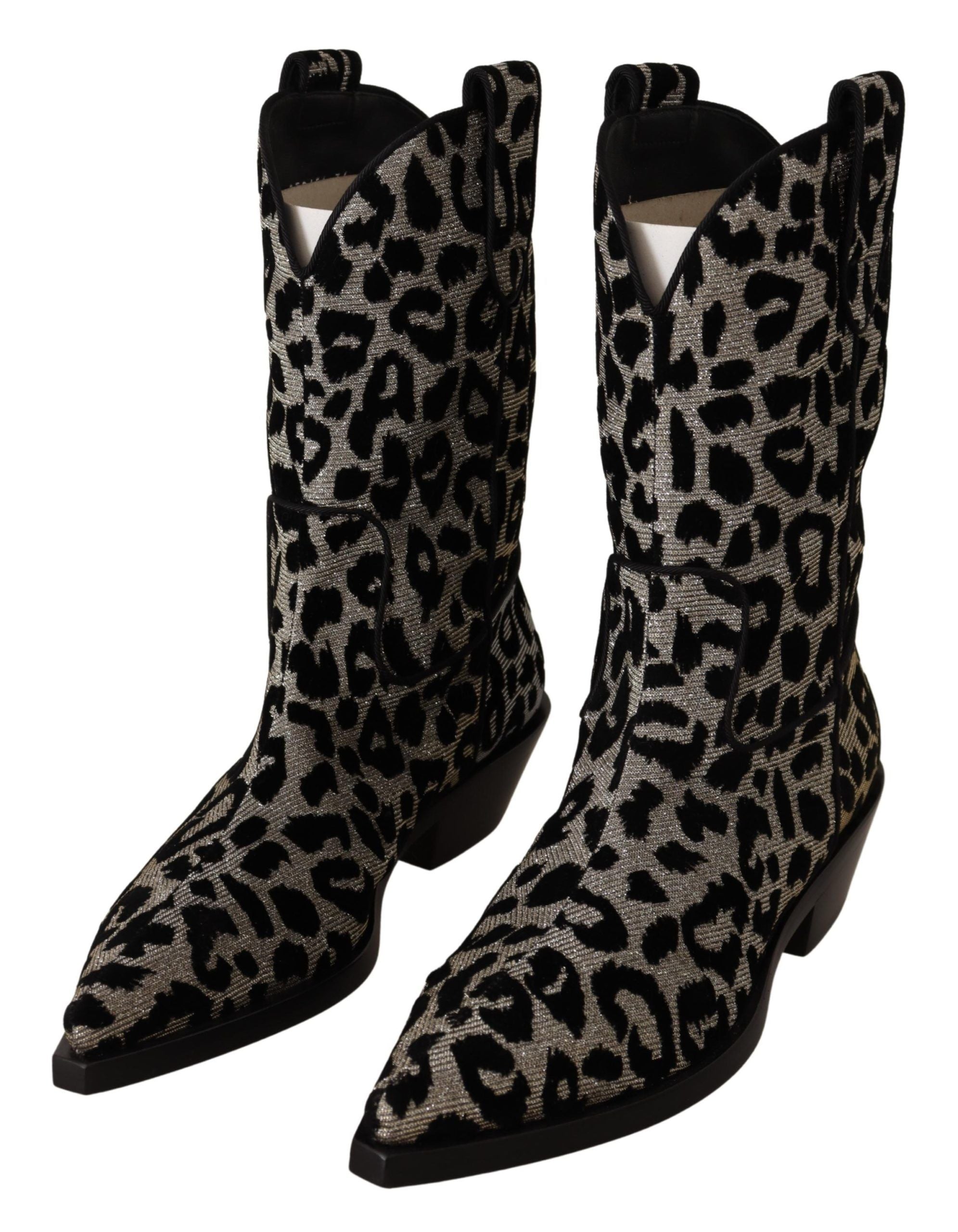 Gray and black leopard print cowboy boots by Dolce & Gabbana, featuring pointed toes and Western-style design.