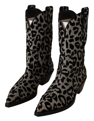 Gray and black leopard print cowboy boots by Dolce & Gabbana, featuring pointed toes and Western-style design.