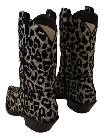 Gray and black leopard print cowboy boots by Dolce & Gabbana with pointed toes and Western style.