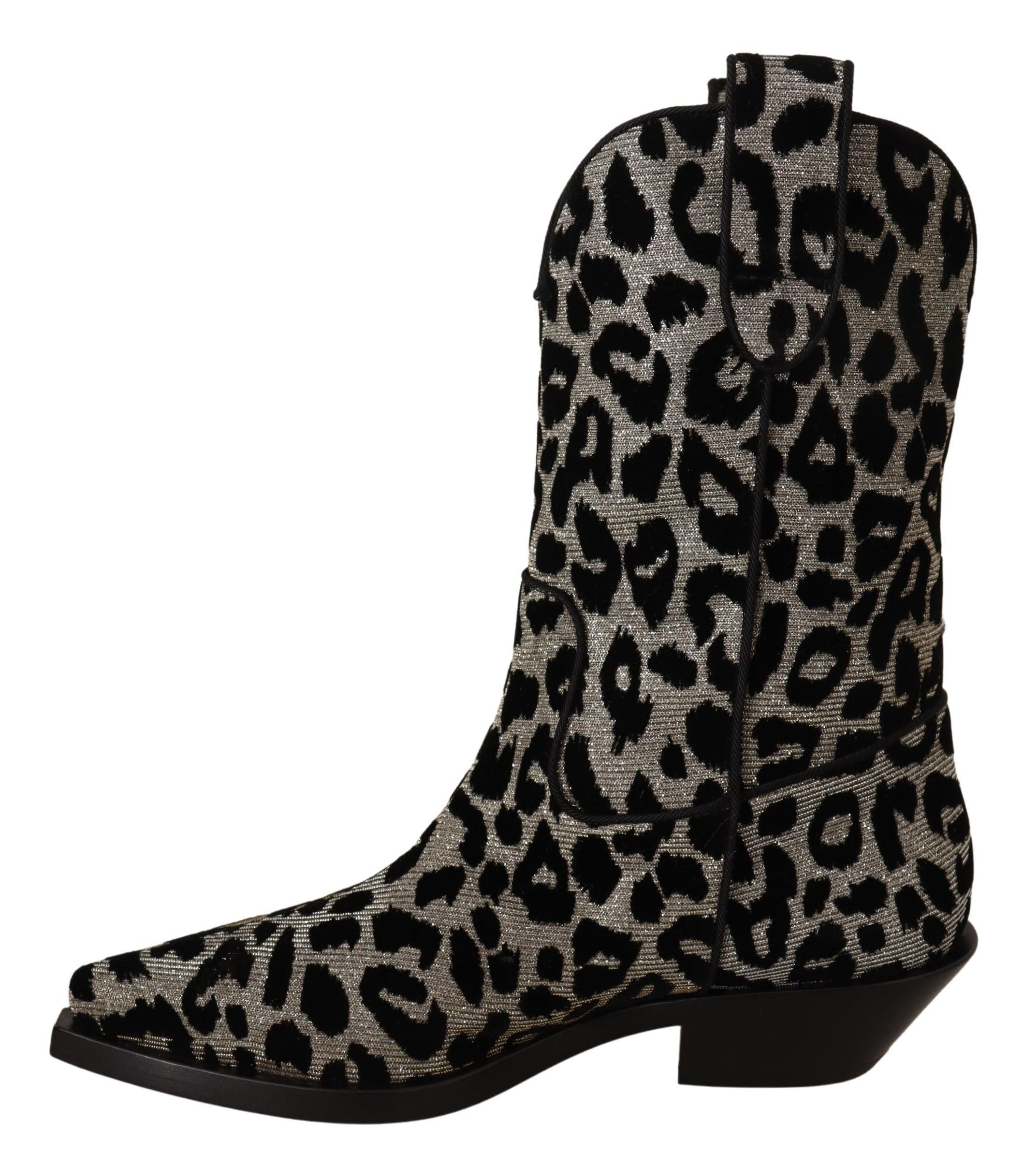 Gray and black leopard print cowboy boots by Dolce & Gabbana with pointed toes and Western-style heels.