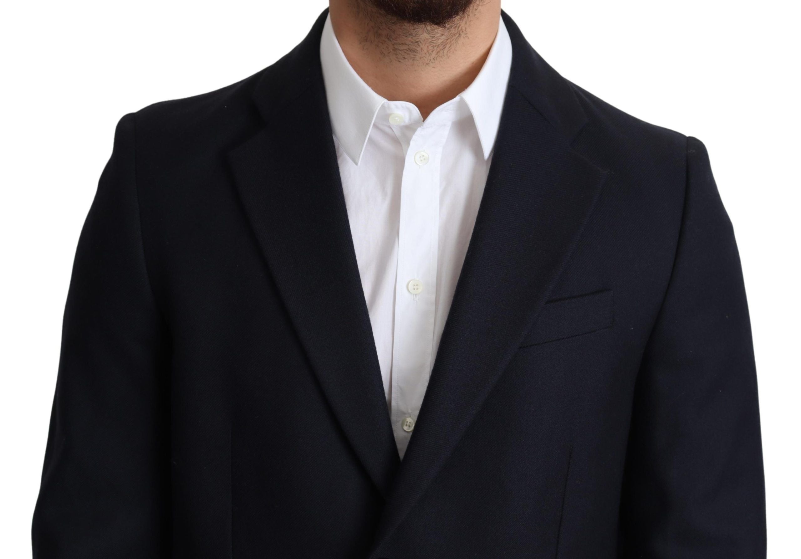 Dark blue wool single-breasted coat jacket by Dolce & Gabbana, shown on a model with a tailored fit and classic lapel design.