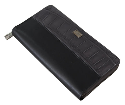 Black Dolce & Gabbana zip-around continental leather wallet featuring multiple card slots and sleek design.