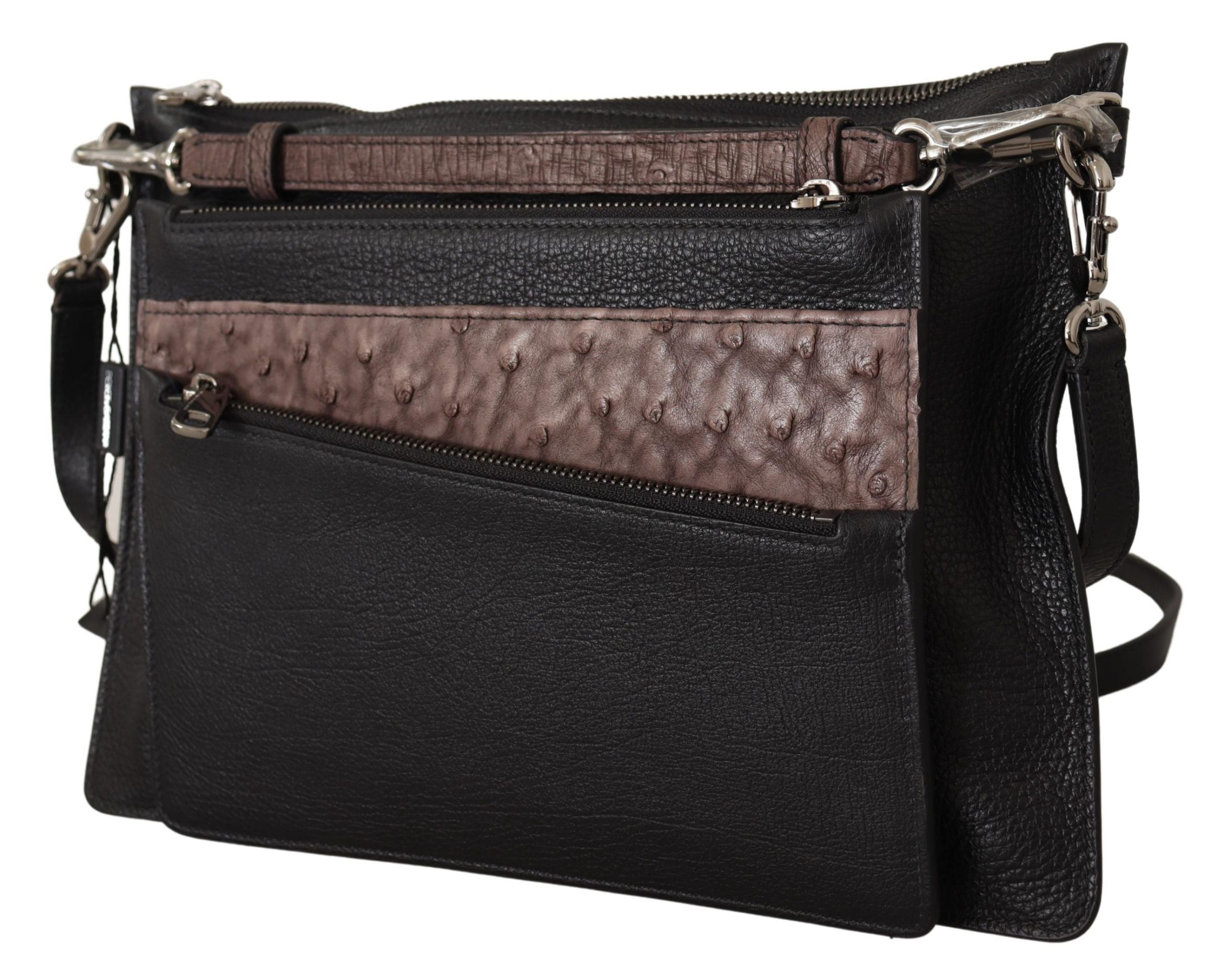 Black exotic leather shoulder sling bag by Dolce & Gabbana with sleek design and silver hardware details.