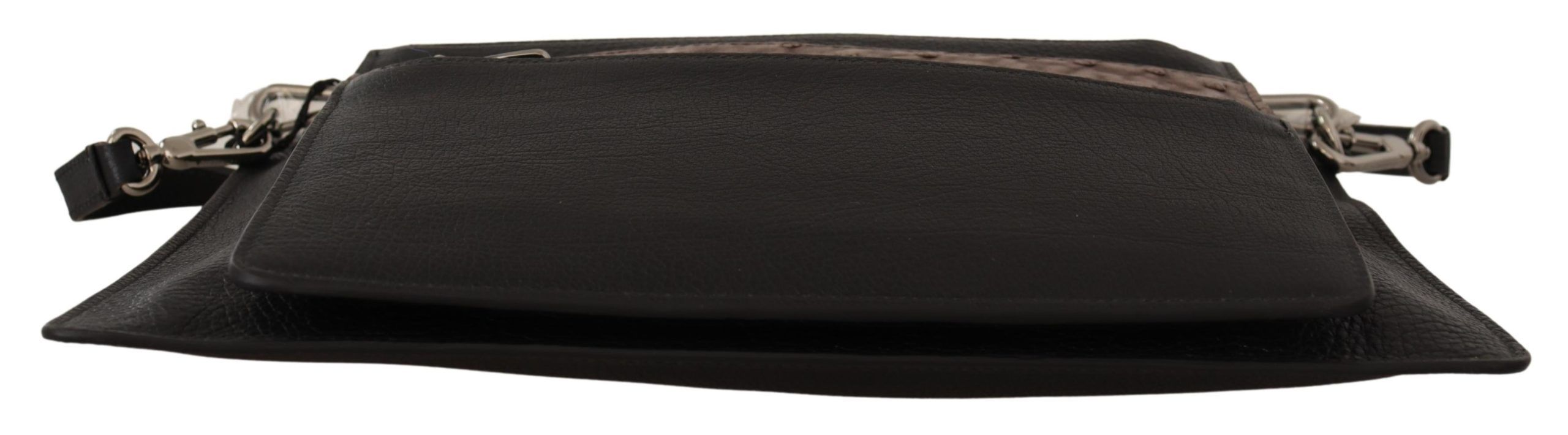Black exotic leather shoulder sling bag by Dolce & Gabbana, featuring a sleek design and stylish metal hardware.