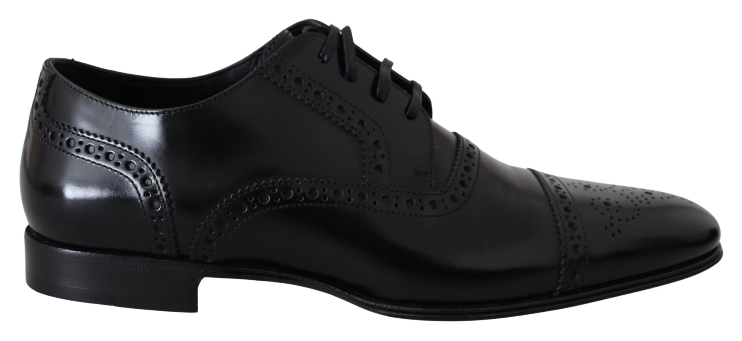 Black leather men’s Derby formal loafers by Dolce & Gabbana, featuring sleek design and classic slip-on style.