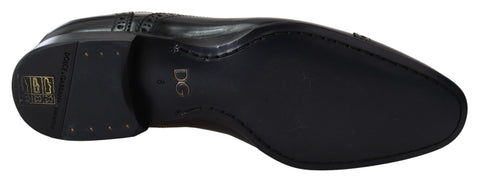 Black leather men's Derby loafers shoes by Dolce & Gabbana, featuring sleek design and polished finish.
