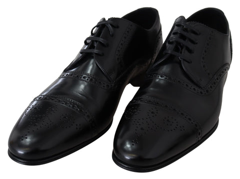 Black leather men's Derby loafers by Dolce & Gabbana, featuring classic formal design and sleek craftsmanship.