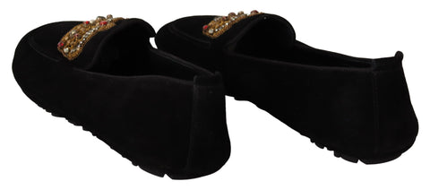 Black leather crystal-embellished gold crown loafers by Dolce & Gabbana showing detailed craftsmanship and luxurious design.