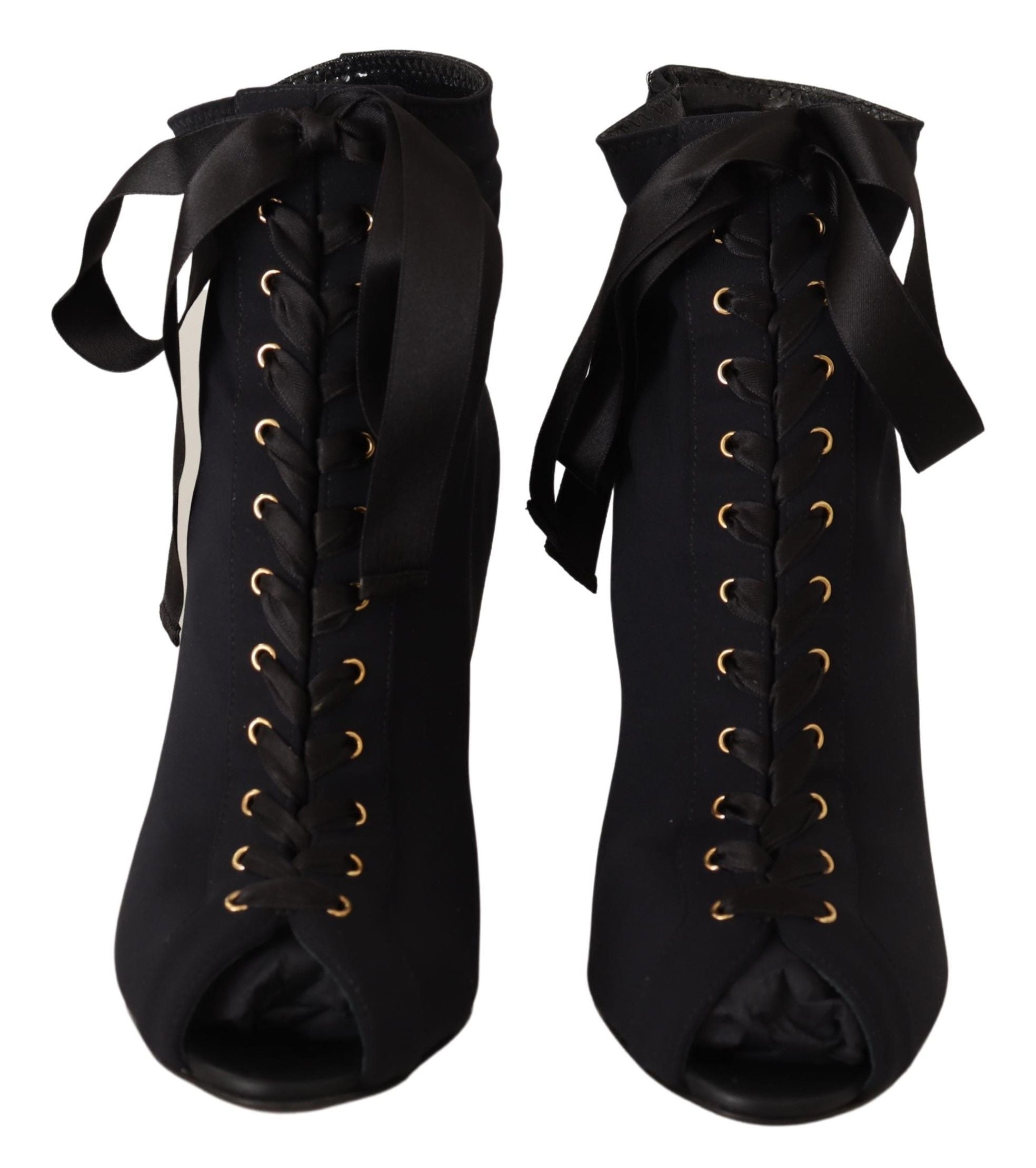 Black stretch ankle boots by Dolce & Gabbana featuring sleek design and fitted silhouette on a plain background.