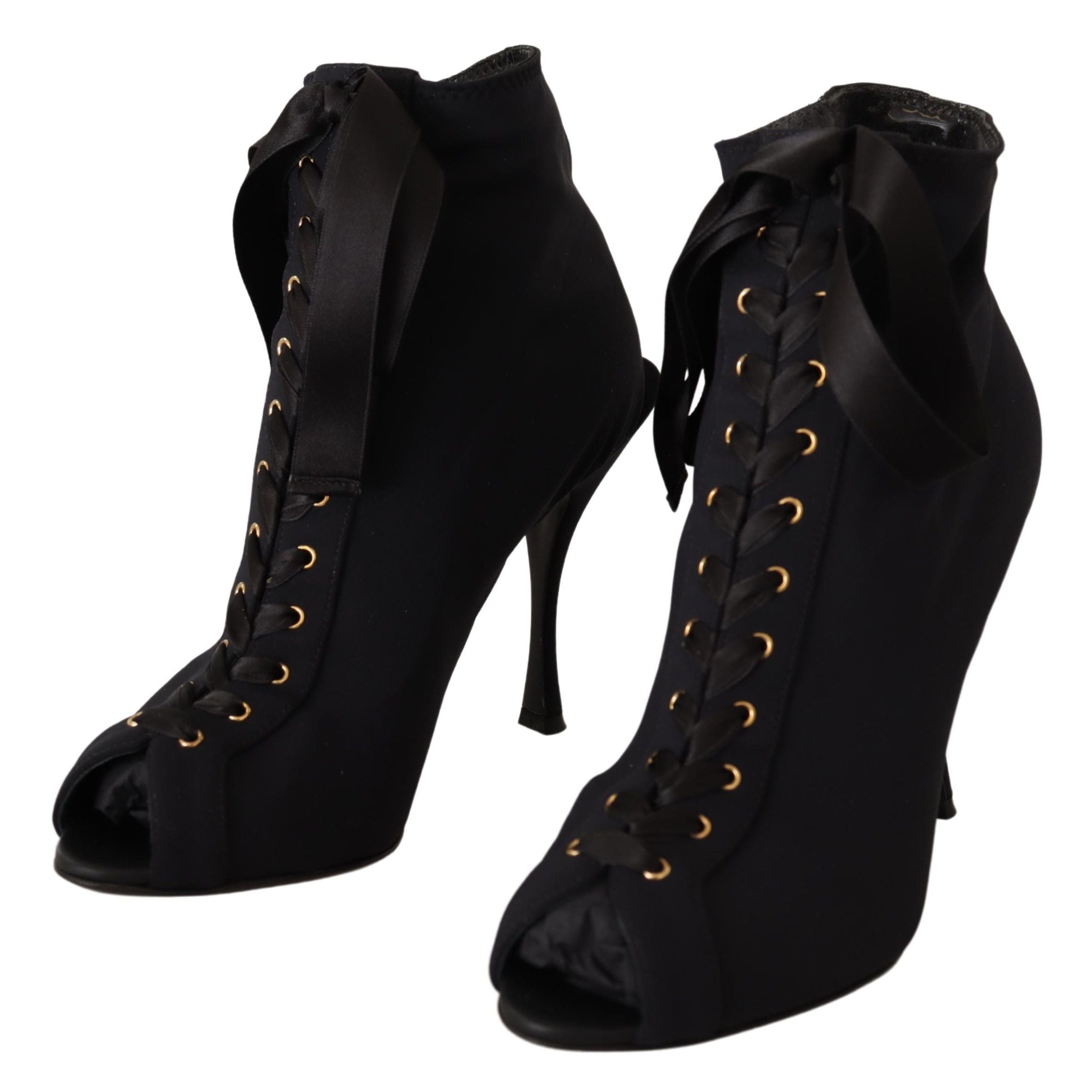 Black stretch ankle boots by Dolce & Gabbana with sleek design and smooth finish, perfect for stylish casual or dressy outfits.