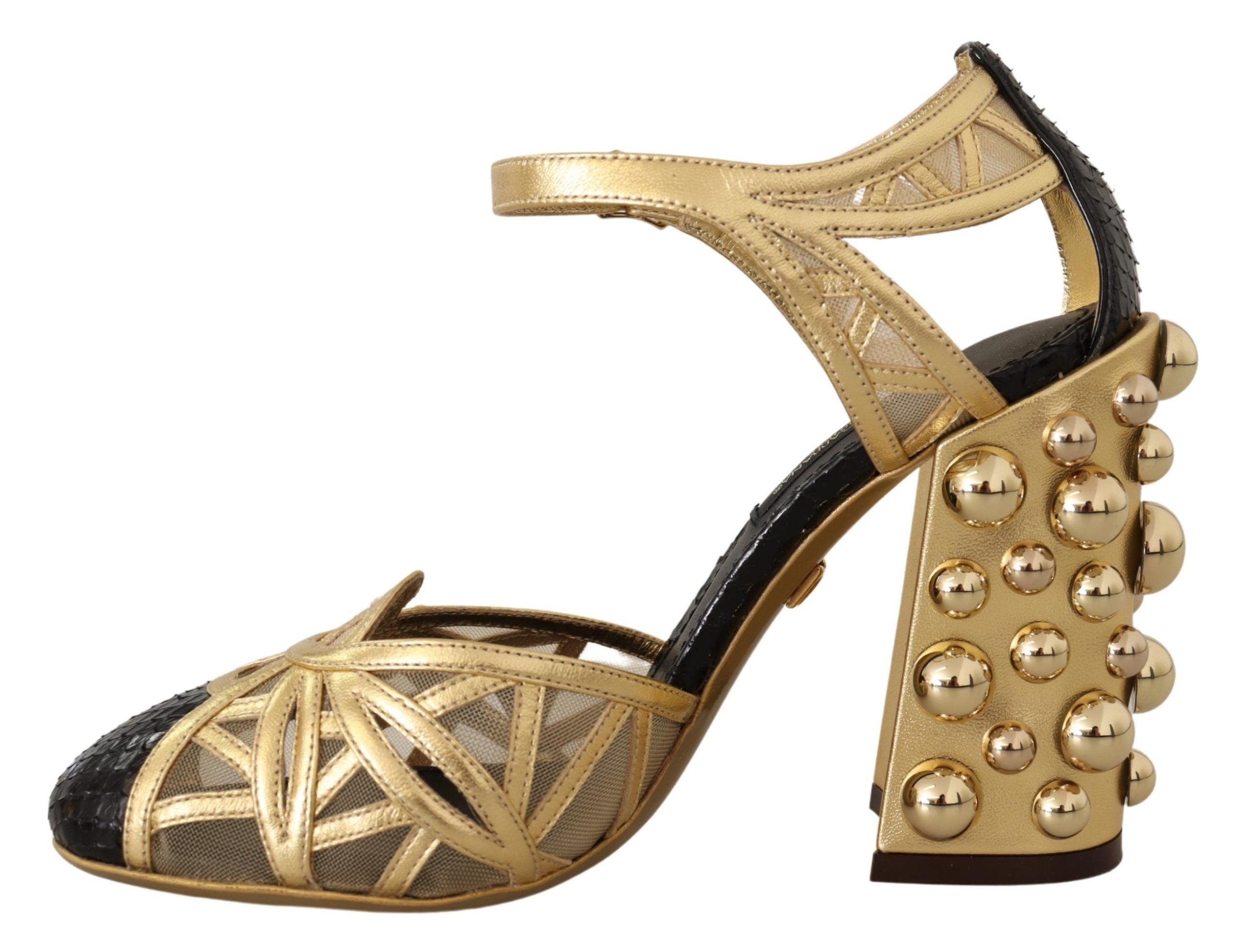 Black leather ankle strap shoes with gold studs by Dolce & Gabbana, featuring a sleek design and pointed toe.