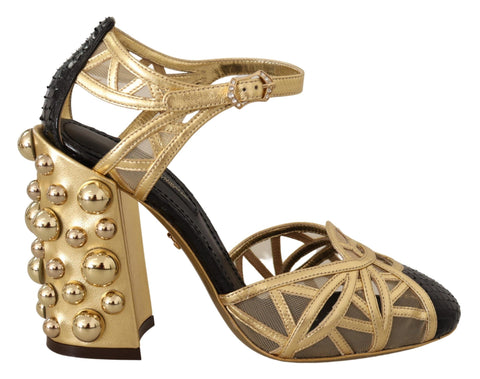 Black leather ankle strap shoes with gold studs by Dolce & Gabbana, featuring a sleek, stylish design and pointed toe.