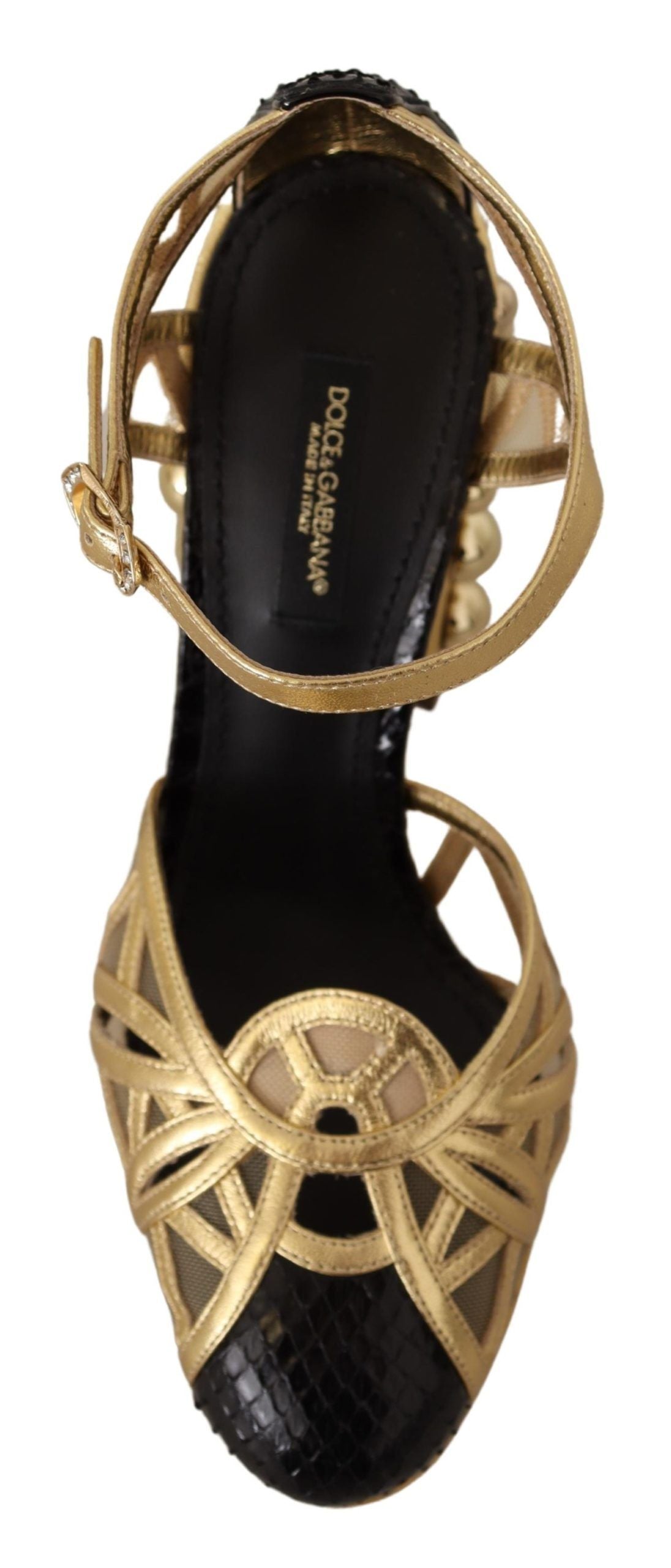 Black gold leather studded ankle strap shoes by Dolce & Gabbana with pointed toes and decorative gold studs.