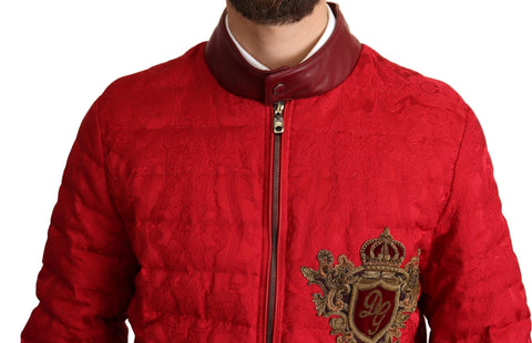 Red brocade bomber jacket with gold crown logo from Dolce & Gabbana, featuring intricate embroidery and a stylish fit.