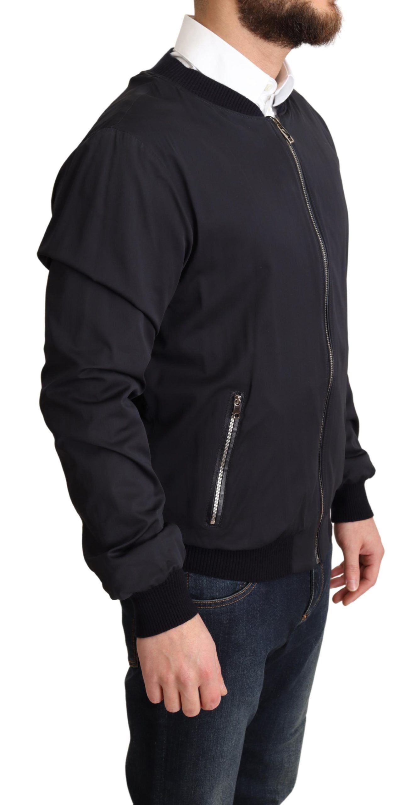Blue silk bomber jacket for men by Dolce & Gabbana, featuring a short style with a sleek, smooth appearance.