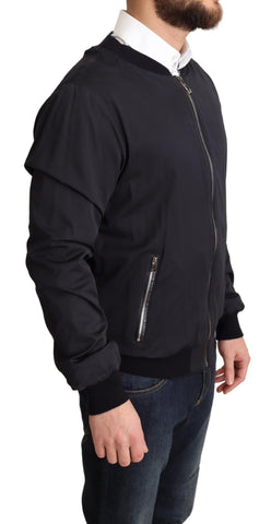 Blue silk bomber jacket for men by Dolce & Gabbana, featuring a short style with a sleek, smooth appearance.