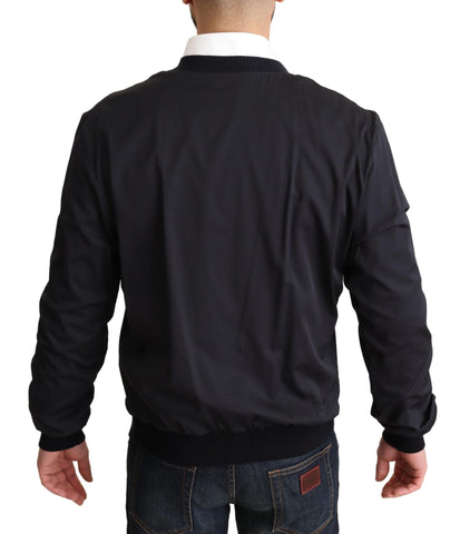 Blue silk bomber jacket for men by Dolce & Gabbana, featuring a short, stylish design and smooth satin finish.