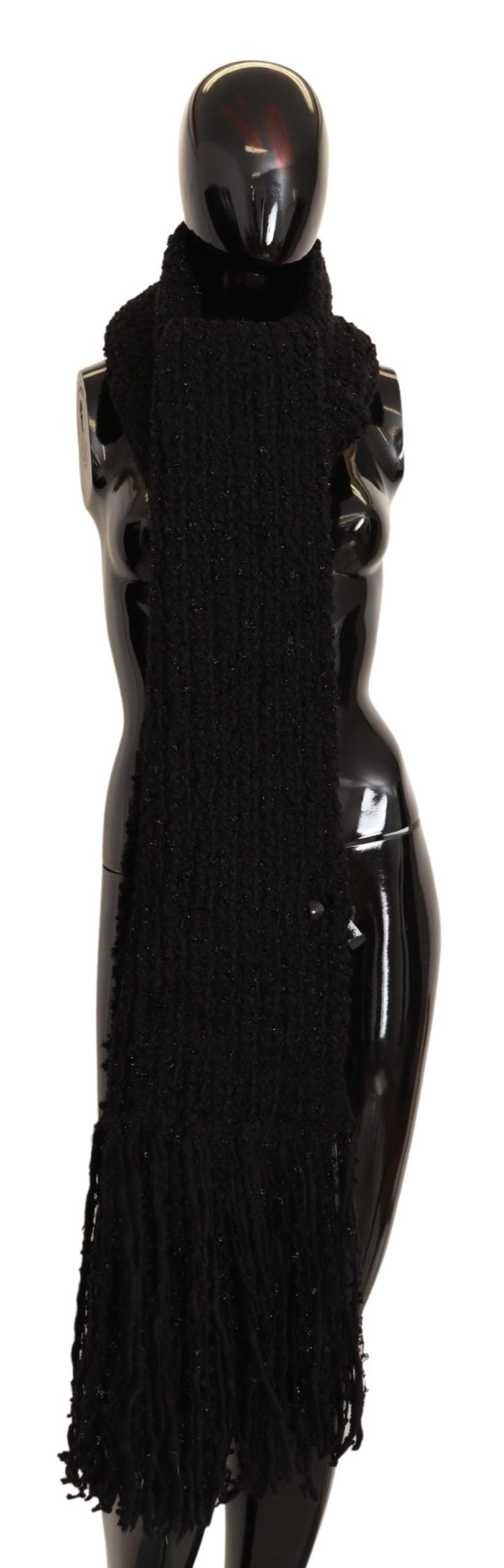 Black Virgin Wool knitted wrap shawl scarf by Dolce & Gabbana displayed flat with textured knit pattern.