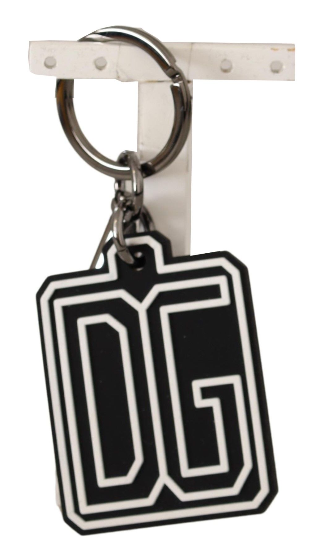 Black and white Dolce & Gabbana rubber logo silver ring keychain with branded design and metal ring attachment.