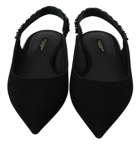 Black Dolce & Gabbana slingback flats made of charmeuse fabric, featuring a sleek and elegant design.
