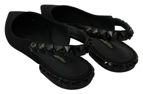 Black Dolce & Gabbana slingback flats made of charmeuse fabric, featuring a sleek and elegant design.
