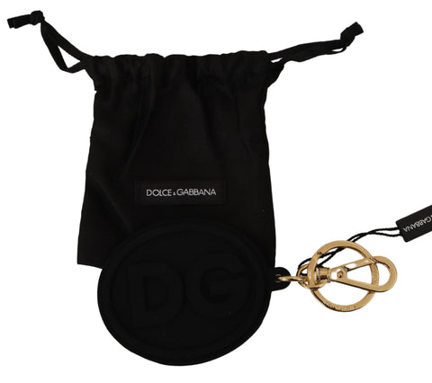 Black rubber Dolce & Gabbana keyring with gold brass DG logo, featuring a stylish metal keychain accessory.