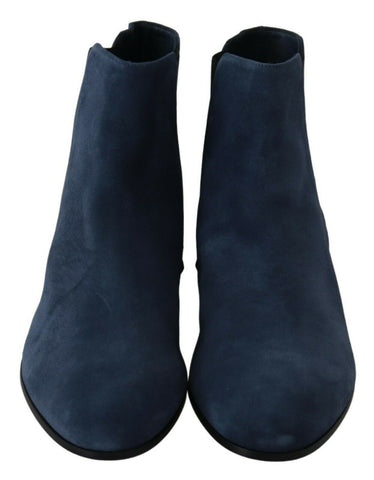 Blue suede studded boots with embellishments from Dolce & Gabbana, featuring a stylish design and pointed toe.