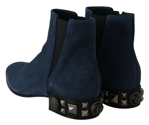 Blue suede studded boots with embellishments from Dolce & Gabbana, featuring a stylish, textured design and pointed toe.