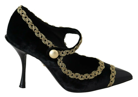 Black velvet Mary Jane pumps with embellishments from Dolce & Gabbana, featuring a classic strap and decorative details.
