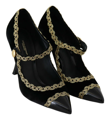 Black velvet Mary Jane pumps with embellished details by Dolce & Gabbana, featuring a classic strap and elegant design.