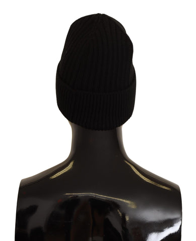 Black wool knit women's winter hat by Dolce & Gabbana, featuring a cozy, stylish knit design for cold weather.