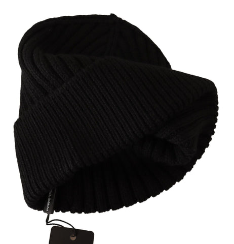 Black wool knit winter hat for women by Dolce & Gabbana, featuring a cozy, stylish design for cold weather.